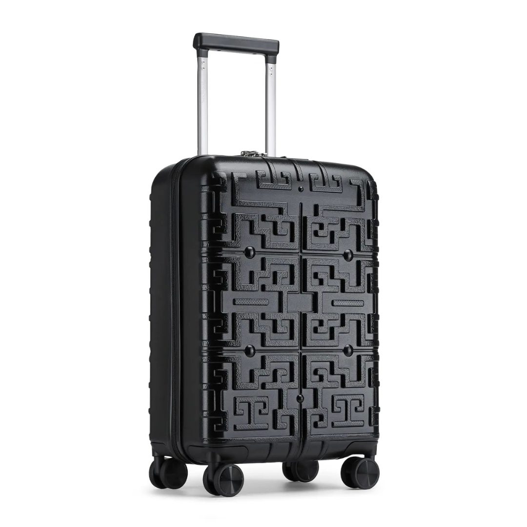 Black hard-shell suitcase with a raised geometric pattern, featuring a telescopic handle and 360° spinner wheels for smooth and effortless transport.