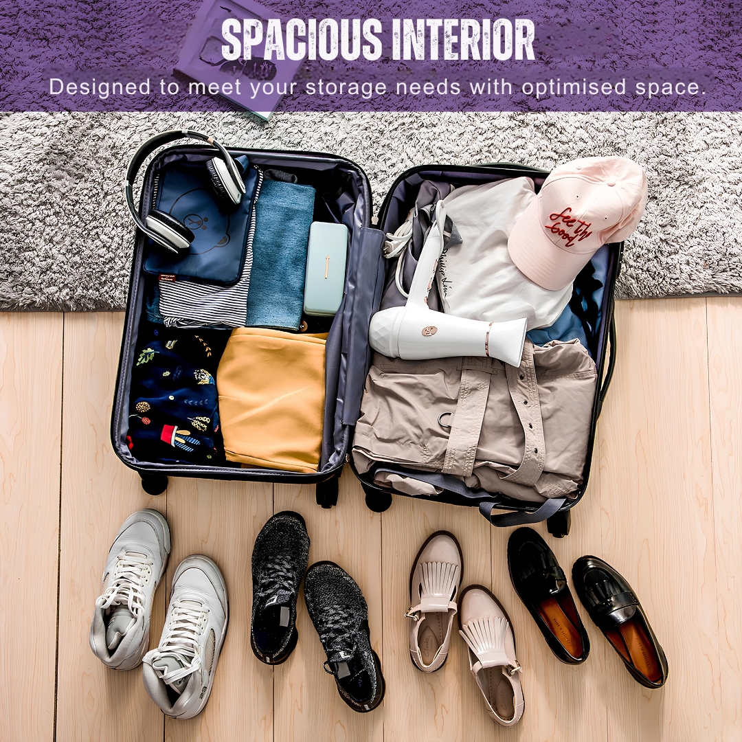 Interior view of an open purple suitcase, showcasing its large, optimised storage space for organising clothes, accessories, and shoes.